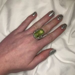 Silver and green ring